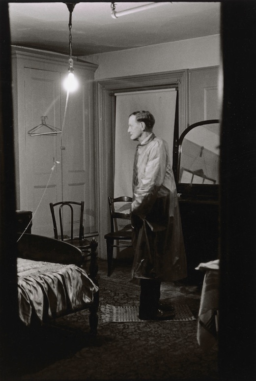 1. The Backwards Man in his hotel room, N.Y.C. 1961